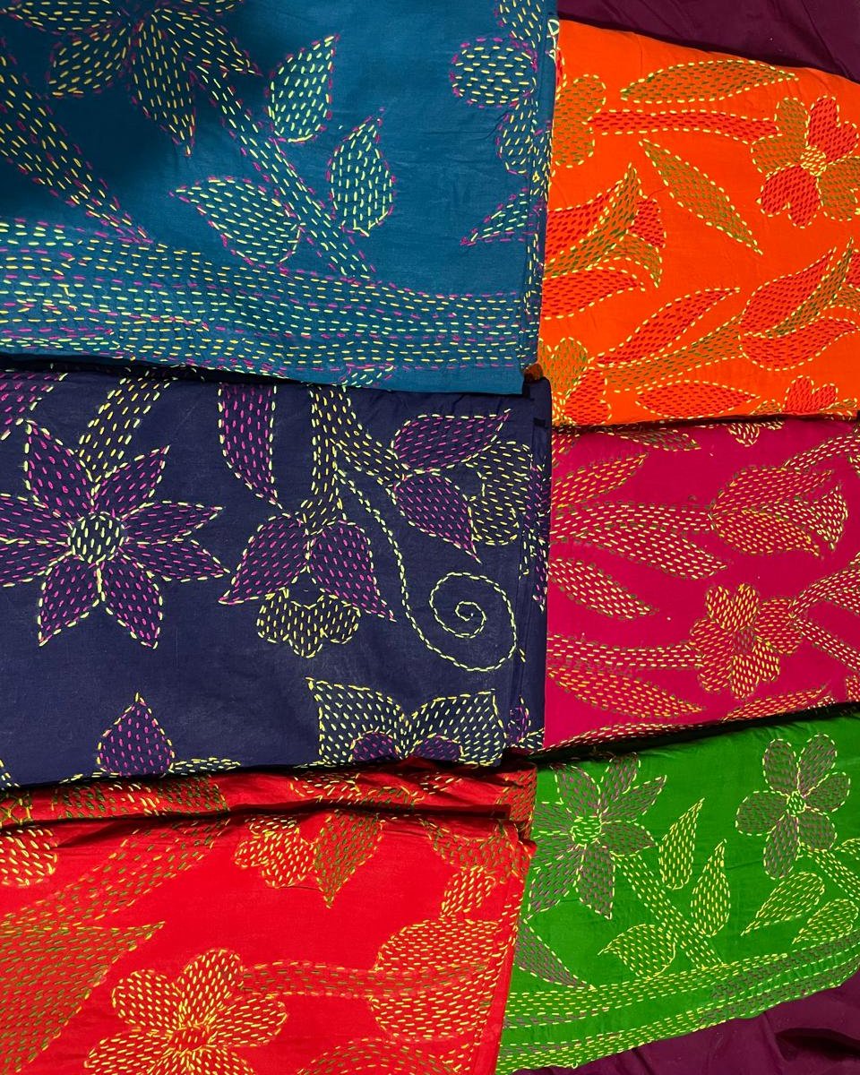 Kantha throws in six colours with flower and leaf running stitch